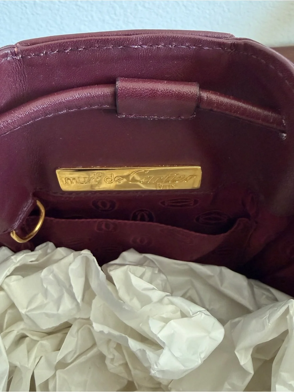 Leather Cartier Drawstring Bucket Bag in Deep Burgundy